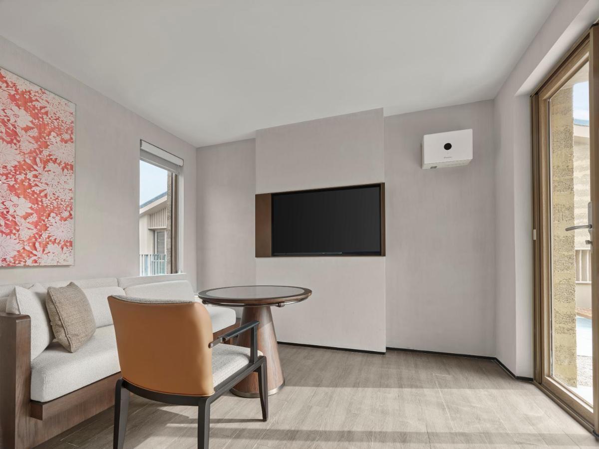 Angsana Chengdu Wenjiang Hotell Exteriör bild